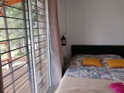 Cabaña - Dormitorio principal con cama doble